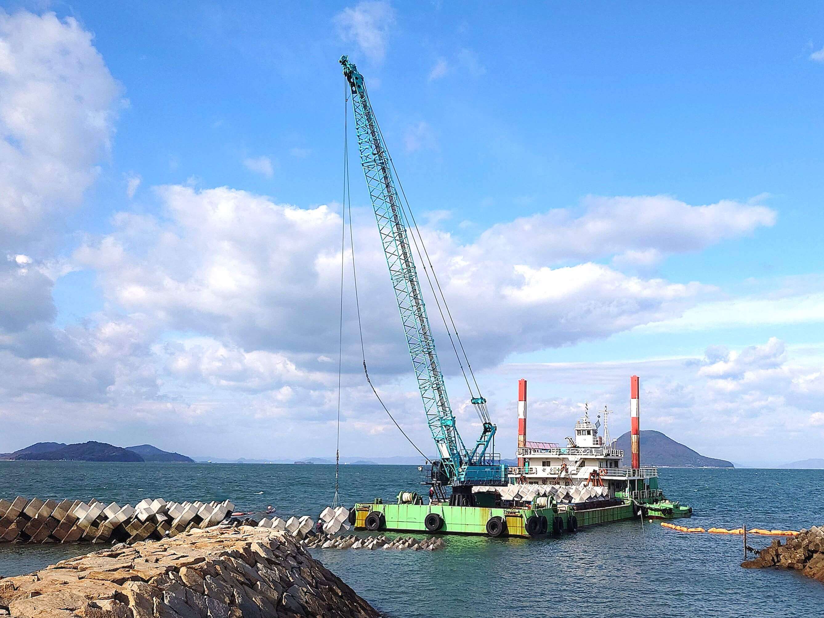 中海改修第１号　東白方海岸　海岸改修工事（消波工）/重成土建
